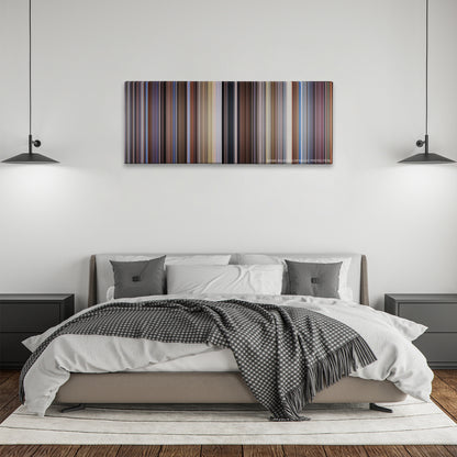 Raising Arizona color palette canvas above a bed, between two black pendant lamps