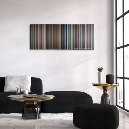 Requiem for a Dream color palette canvas above a black sofa with a gold-topped table