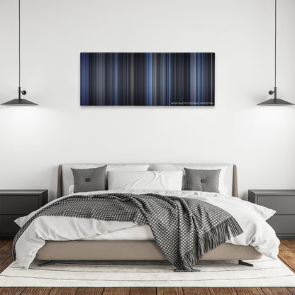 Payback color palette canvas above a bed, between two black pendant lamps