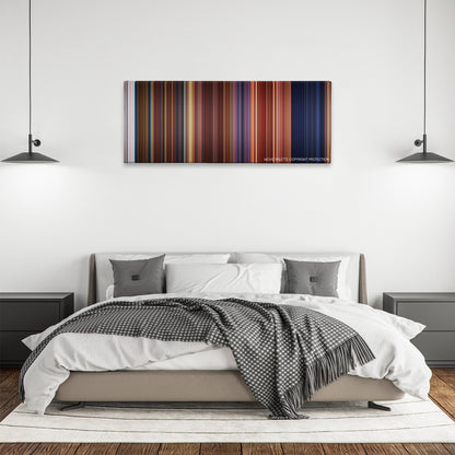 Lara Croft Tomb Raider: The Cradle of Life color palette canvas above a bed, between two black pendant lamps
