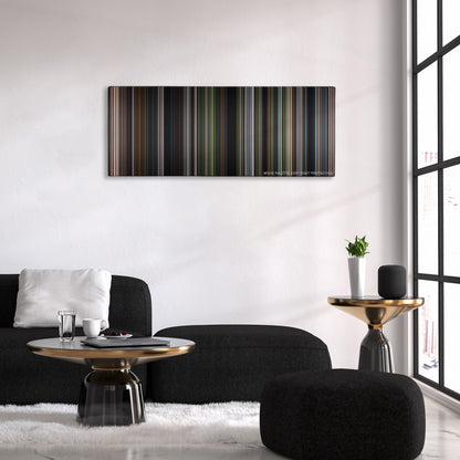 After Earth color palette canvas above a black sofa with a gold-topped table