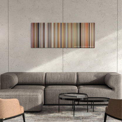 Fahrenheit 9/11 color palette canvas on a concrete wall above a gray sectional sofa