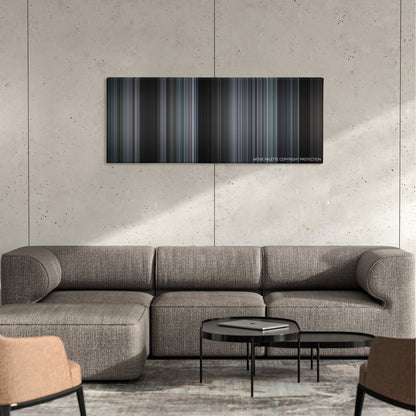 16 Blocks color palette canvas on a concrete wall above a gray sectional sofa