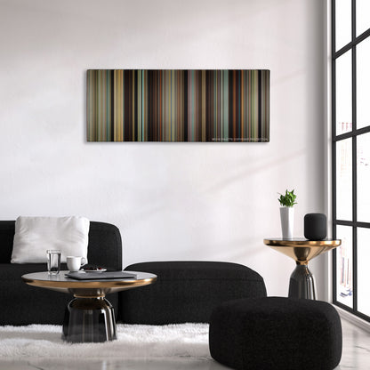 Lady Bird color palette canvas above a black sofa with a gold-topped table