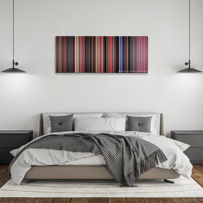 Incredibles 2 color palette canvas above a bed, between two black pendant lamps