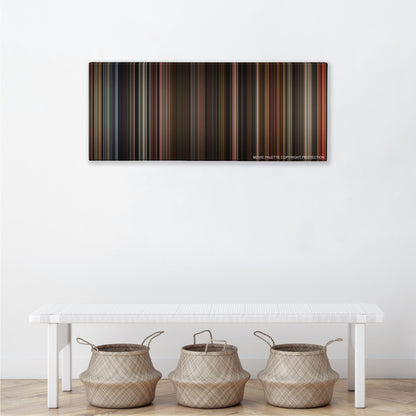 The Greatest Showman color palette canvas above a white bench with three woven baskets