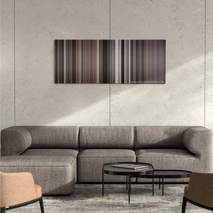Rocky IV color palette canvas on a concrete wall above a gray sectional sofa