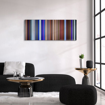 Soul color palette canvas above a black sofa with a gold-topped table