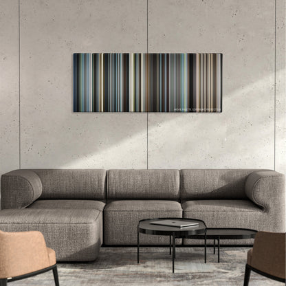 Syriana color palette canvas on a concrete wall above a gray sectional sofa