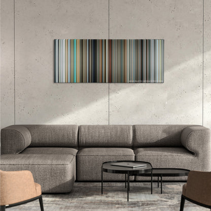 Mr. Nobody color palette canvas on a concrete wall above a gray sectional sofa