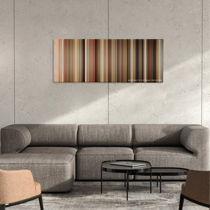 The Break-Up color palette canvas on a concrete wall above a gray sectional sofa