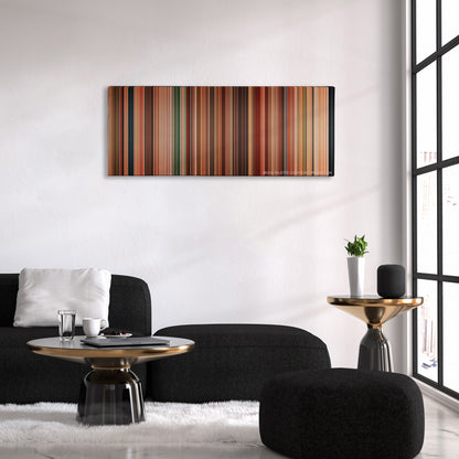 Machete color palette canvas above a black sofa with a gold-topped table