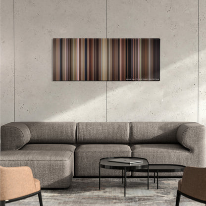 Chinatown color palette canvas on a concrete wall above a gray sectional sofa