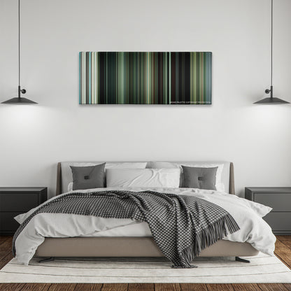 Swiss Army Man color palette canvas above a bed, between two black pendant lamps