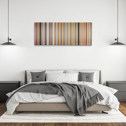 Fahrenheit 9/11 color palette canvas above a bed, between two black pendant lamps