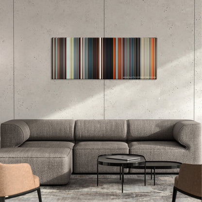 AEon Flux color palette canvas on a concrete wall above a gray sectional sofa