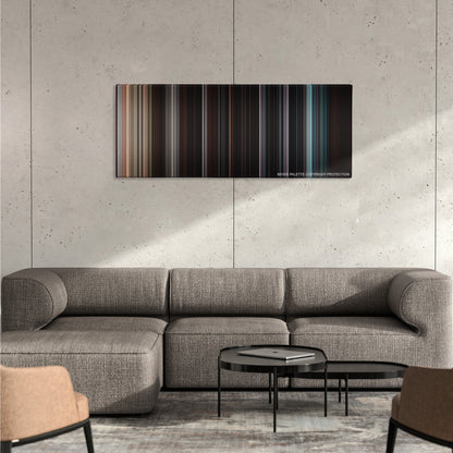 The Cabin in the Woods color palette canvas on a concrete wall above a gray sectional sofa