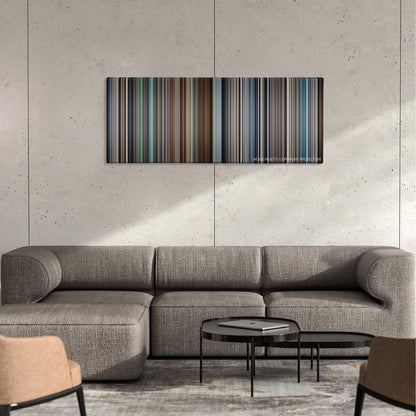 Vice color palette canvas on a concrete wall above a gray sectional sofa