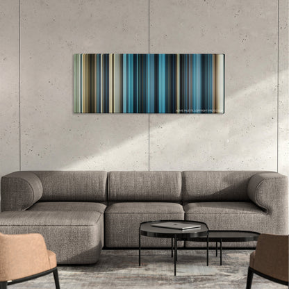 Killer Elite color palette canvas on a concrete wall above a gray sectional sofa