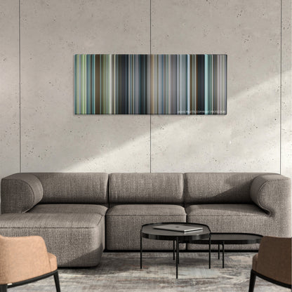 Matchstick Men color palette canvas on a concrete wall above a gray sectional sofa
