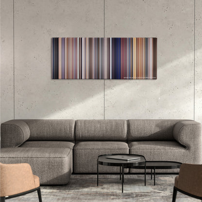 A Clockwork Orange color palette canvas on a concrete wall above a gray sectional sofa