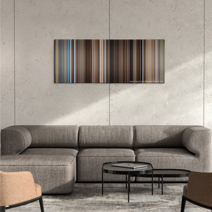 You've Got Mail color palette canvas on a concrete wall above a gray sectional sofa