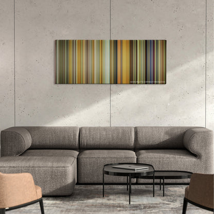 Me and Earl and the Dying Girl color palette canvas on a concrete wall above a gray sectional sofa