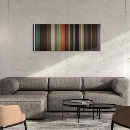 Garden State color palette canvas on a concrete wall above a gray sectional sofa