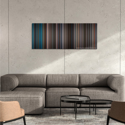 Kingdom of Heaven color palette canvas on a concrete wall above a gray sectional sofa