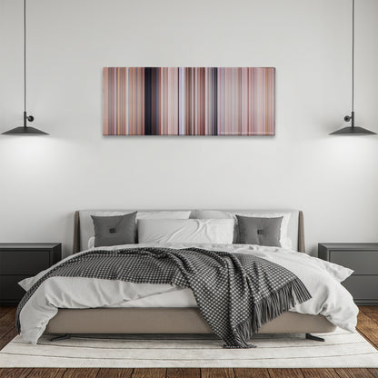 Tremors color palette canvas above a bed, between two black pendant lamps