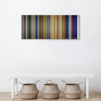 Tarzan color palette canvas above a white bench with three woven baskets