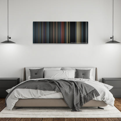 The Hunger Games: Catching Fire color palette canvas above a bed, between two black pendant lamps