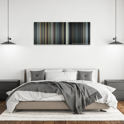 Capote color palette canvas above a bed, between two black pendant lamps