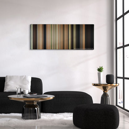 The Sound of Music color palette canvas above a black sofa with a gold-topped table
