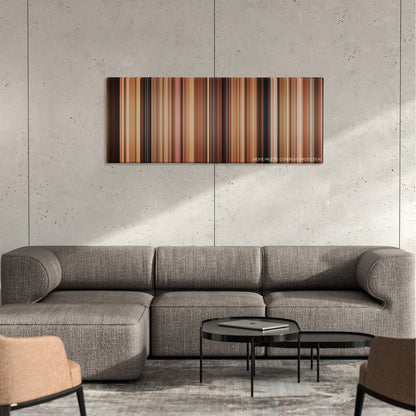 Life as We Know It color palette canvas on a concrete wall above a gray sectional sofa