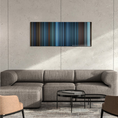 TRON: Legacy color palette canvas on a concrete wall above a gray sectional sofa