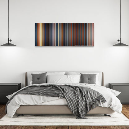 Deep Blue Sea color palette canvas above a bed, between two black pendant lamps