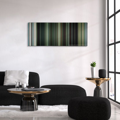 Swiss Army Man color palette canvas above a black sofa with a gold-topped table