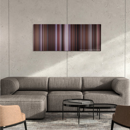 Just Friends color palette canvas on a concrete wall above a gray sectional sofa