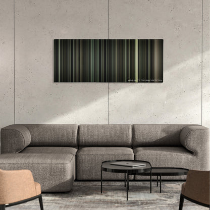 J. Edgar color palette canvas on a concrete wall above a gray sectional sofa