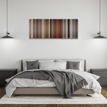 Blazing Saddles color palette canvas above a bed, between two black pendant lamps