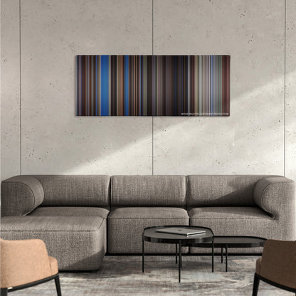 The Last Samurai color palette canvas on a concrete wall above a gray sectional sofa