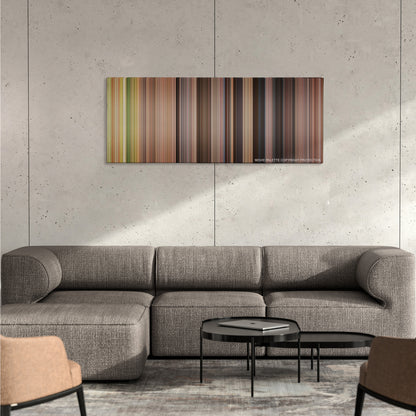 A Knight's Tale color palette canvas on a concrete wall above a gray sectional sofa
