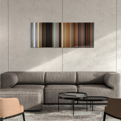 Kill Bill: Vol. 2 color palette canvas on a concrete wall above a gray sectional sofa