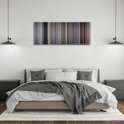 RoboCop color palette canvas above a bed, between two black pendant lamps