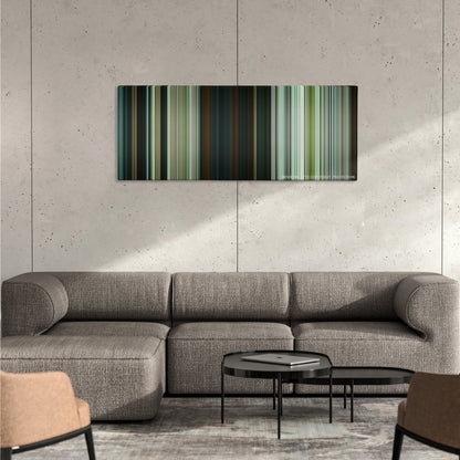 Pirates of the Caribbean: Dead Man's Chest color palette canvas on a concrete wall above a gray sectional sofa