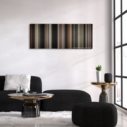 Butch Cassidy and the Sundance Kid color palette canvas above a black sofa with a gold-topped table