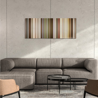 Marriage Story color palette canvas on a concrete wall above a gray sectional sofa