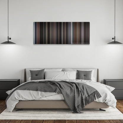 Sleepless in Seattle color palette canvas above a bed, between two black pendant lamps