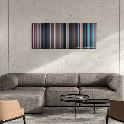 Thunderball color palette canvas on a concrete wall above a gray sectional sofa
